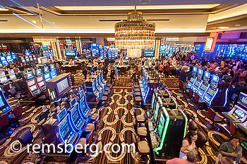 Interior of casino with slot machines.