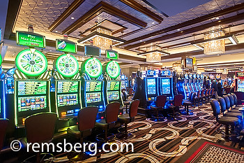 Interior of casino with slot machines.